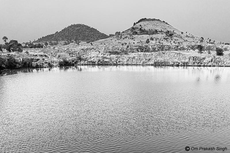 Innovative Water Supply System from Mining Pit - A view of the large catchment feeding the mining pit used for the water supply scheme