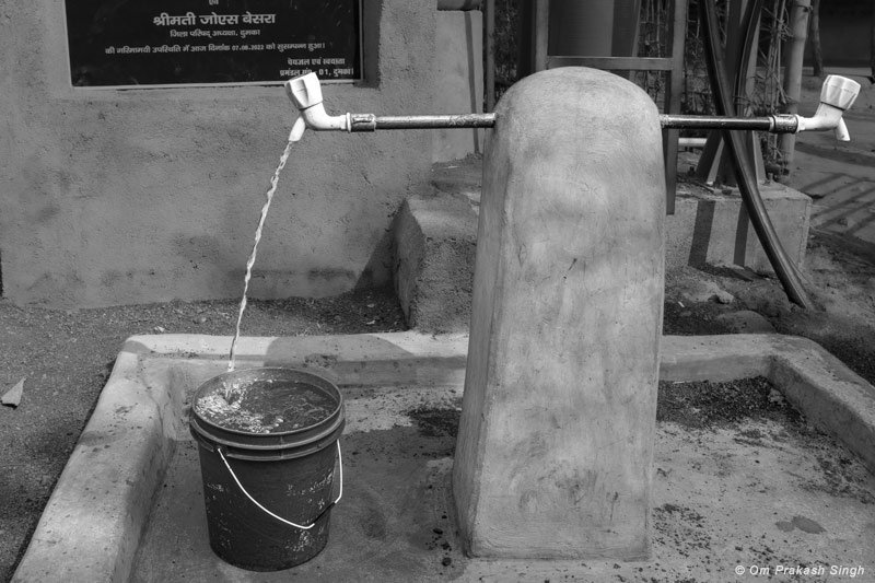 Innovative Water Supply System from Mining Pit - Public standpoint near the water storage tanks supplying treated drinking water